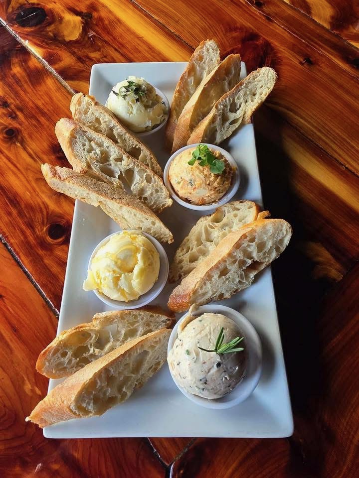 Bread served with a flight of house-made butters